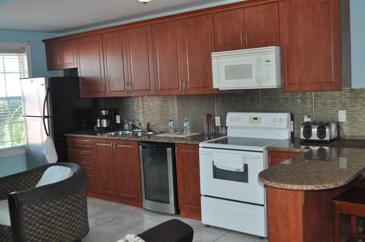 Queen Angel Resort Apartment Провиденсиалес Экстерьер фото